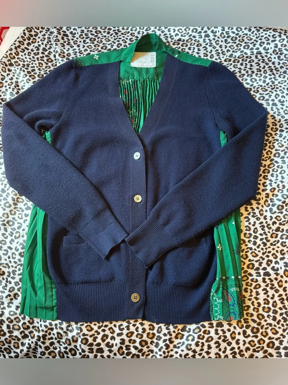 Sacai button piece dramatic