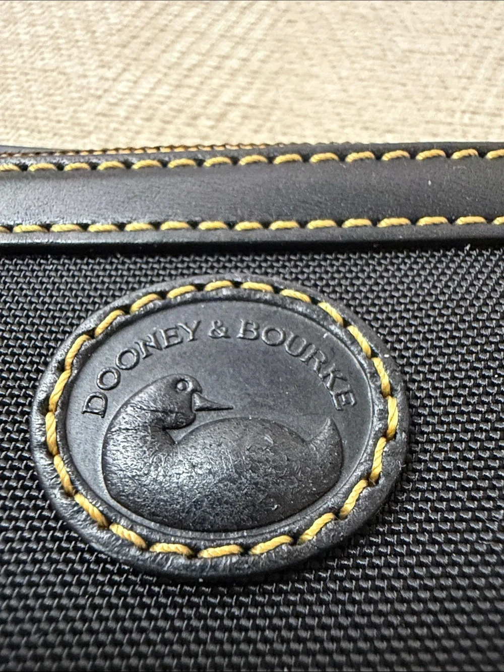 Dooney & Bourke compact black