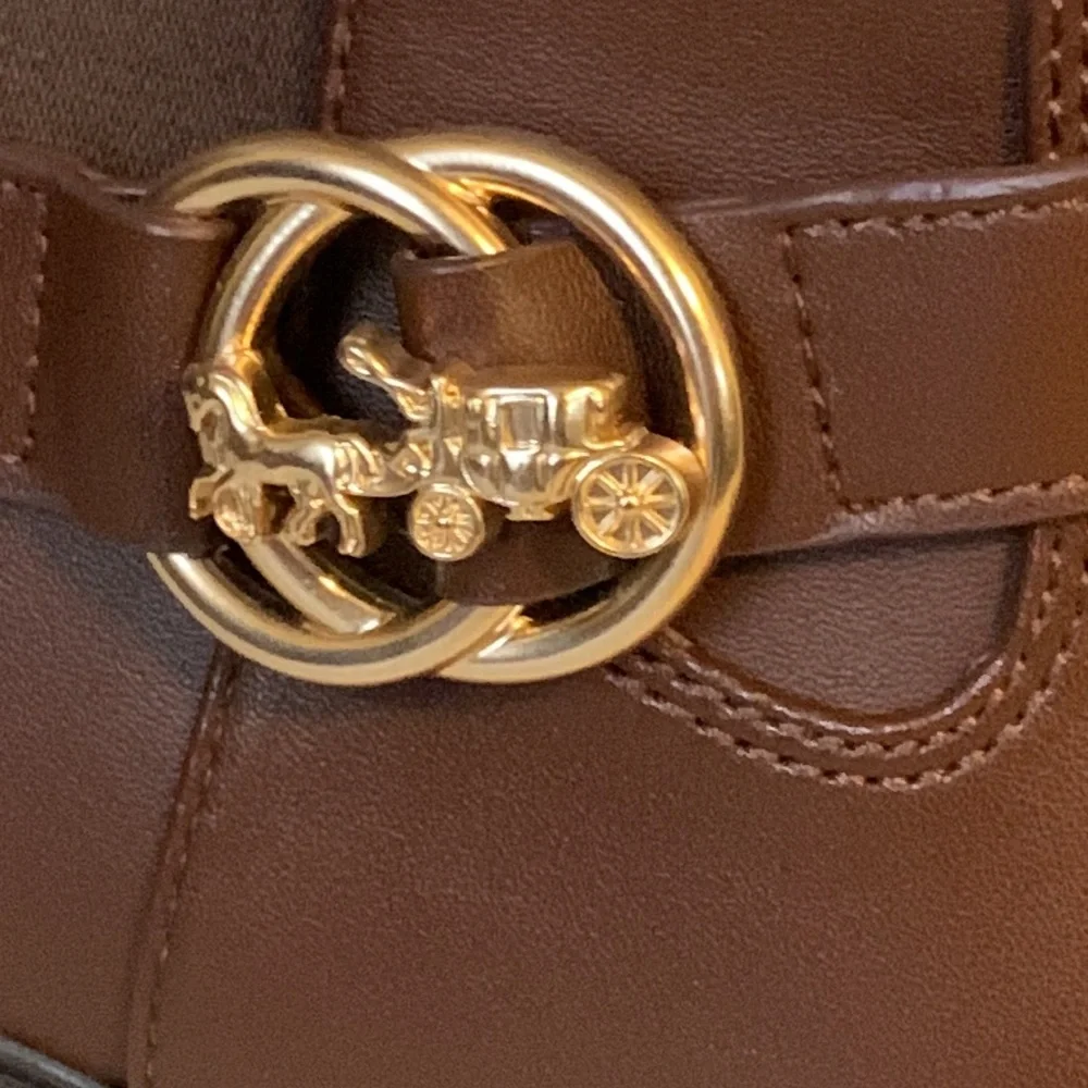 Coach •• new