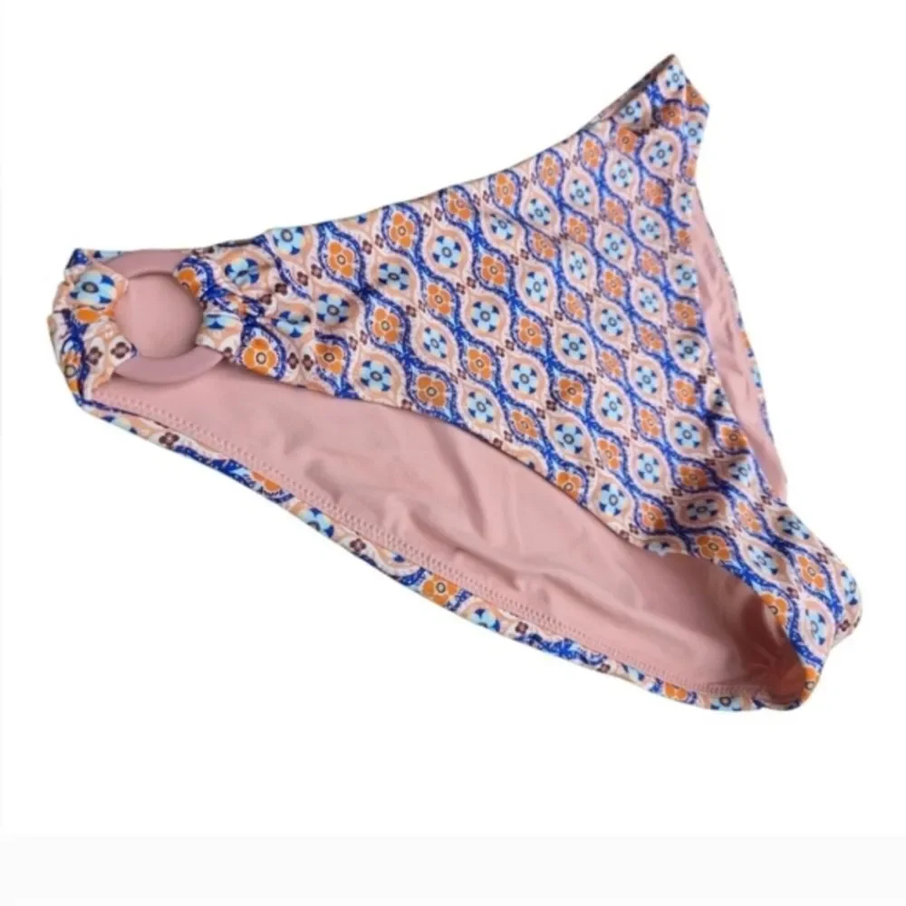 Jets Ring Side. Patterned Pink Bikini Bottom