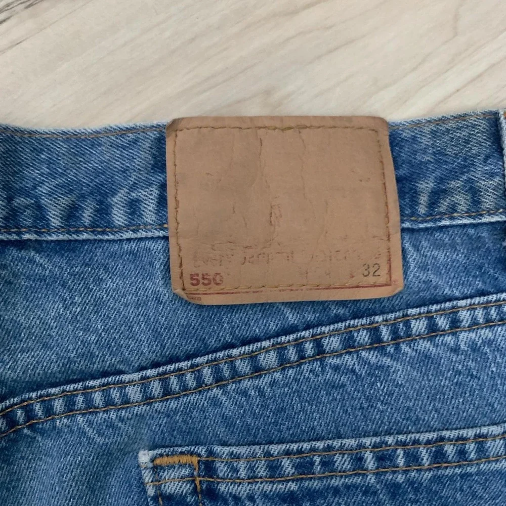 Vintage 1990s Levis 550 Distressed Work Jeans Blue Mens 44x32 Relaxed Fit