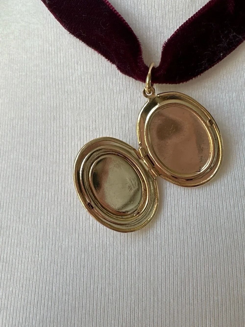 Vintage Burgundy velvet choker with ornate gold cameo portrait locket pendant