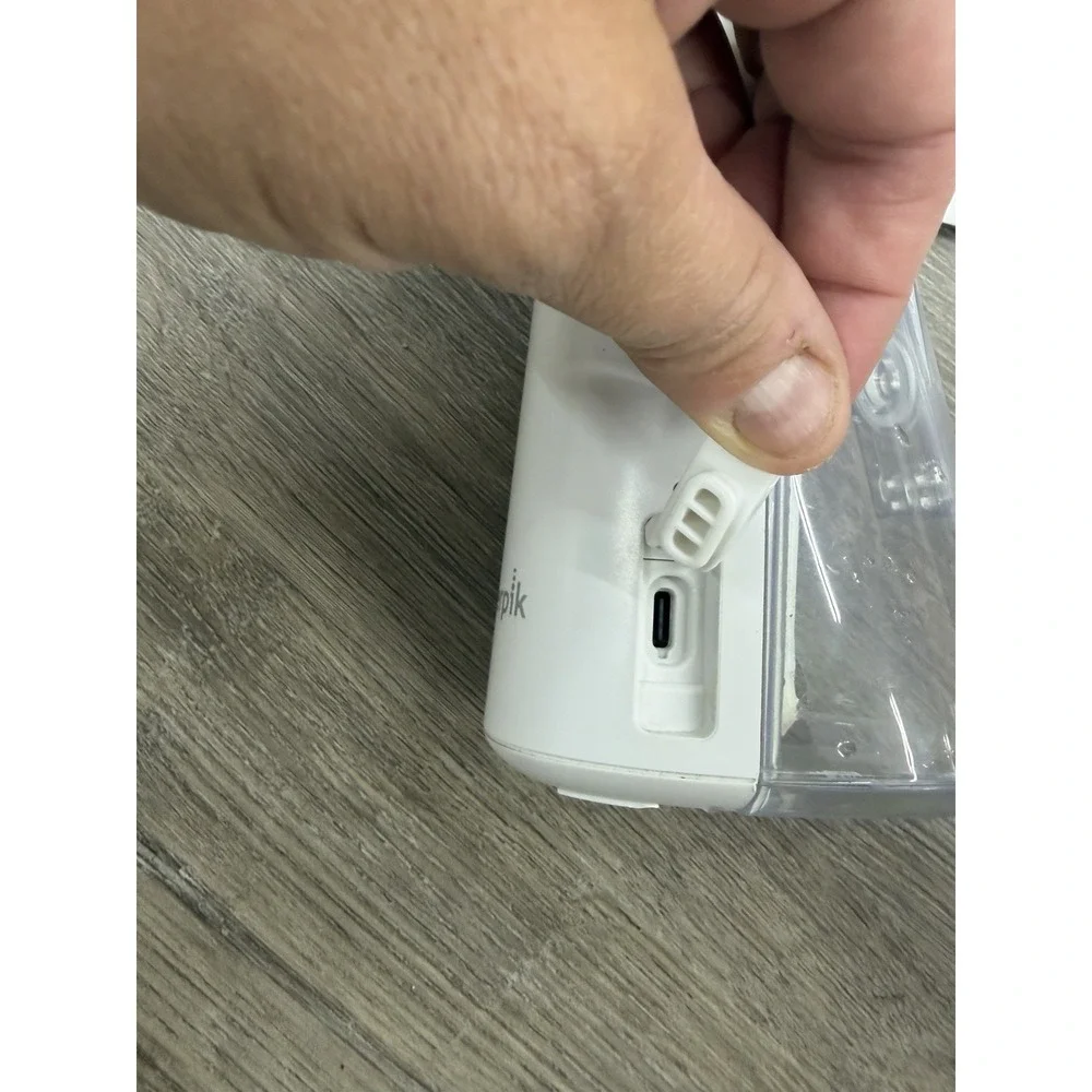 Waterpik Cordless Pulse 3100 Rechargeable Portable Water Flosser With 2 New Tips