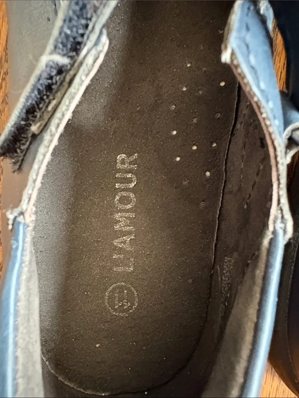 L'Amour girls navy blue with cutout pattern t-strap Mary Jane shoes, size 11.