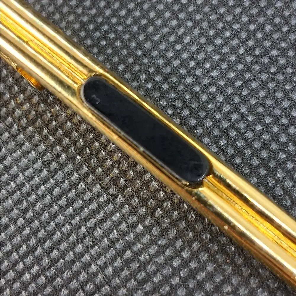 Lord & Taylor vintage gold