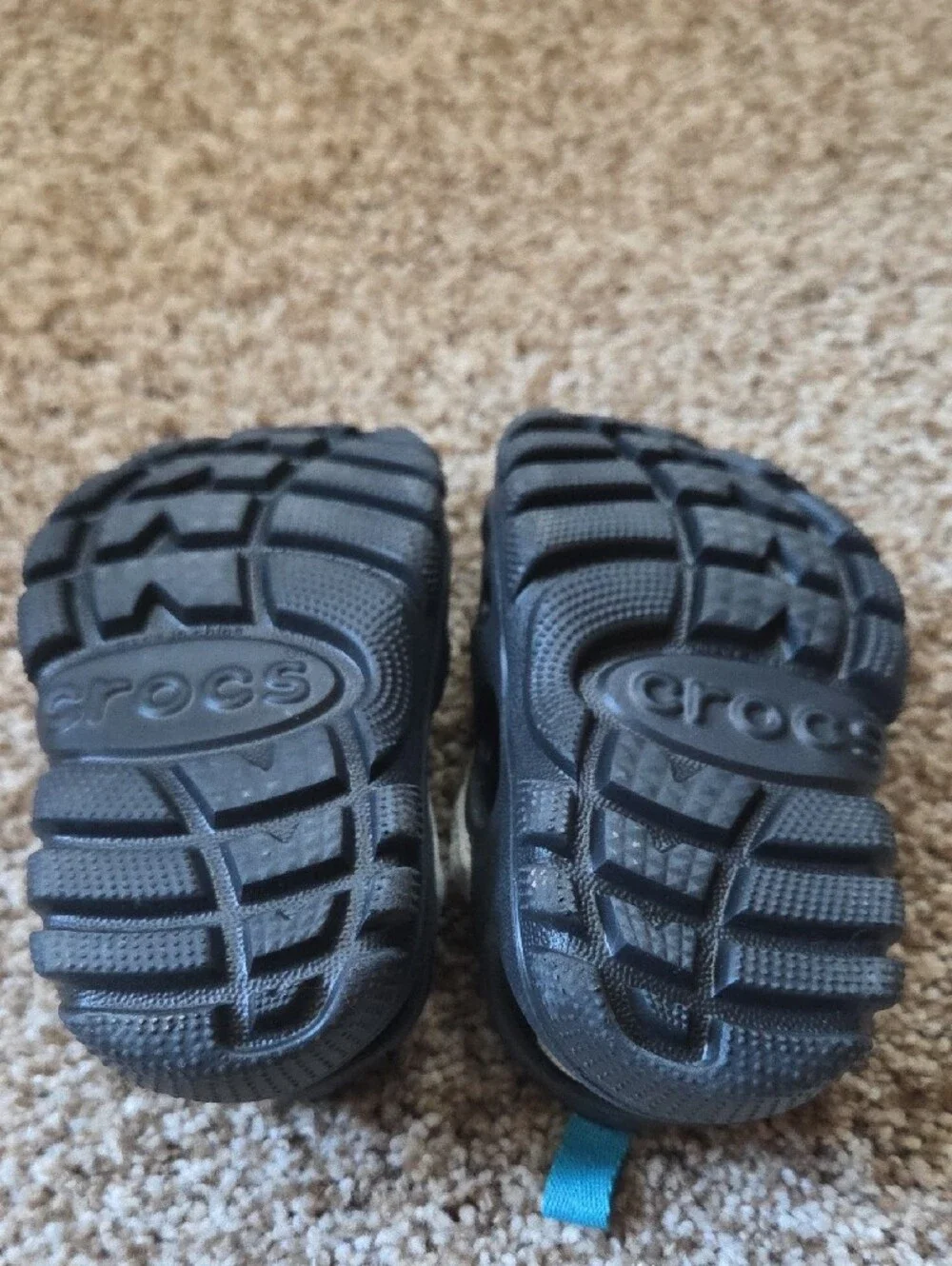 CROCS Kids Black and Beige Clog with Bright Blue Pull Tabs and Charms