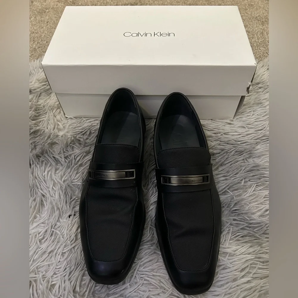 Calvin Klein Black Leather Slip-On Loafers with Metallic Detail. Men’s size 9.5