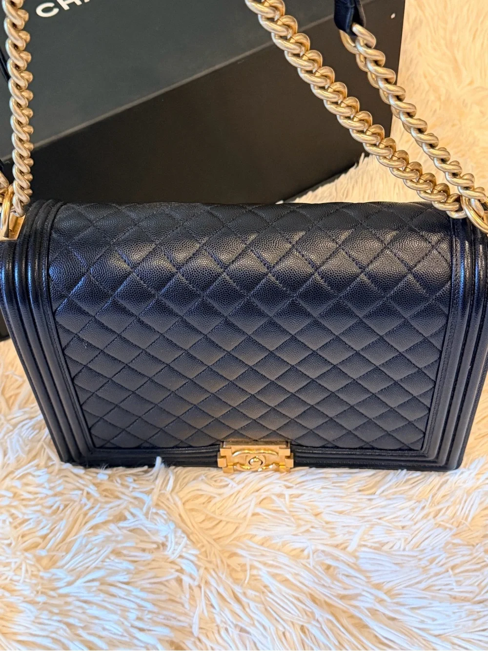 CHANEL Black Quilted Shoulder Bag with Gold Hardware and Chain Strap