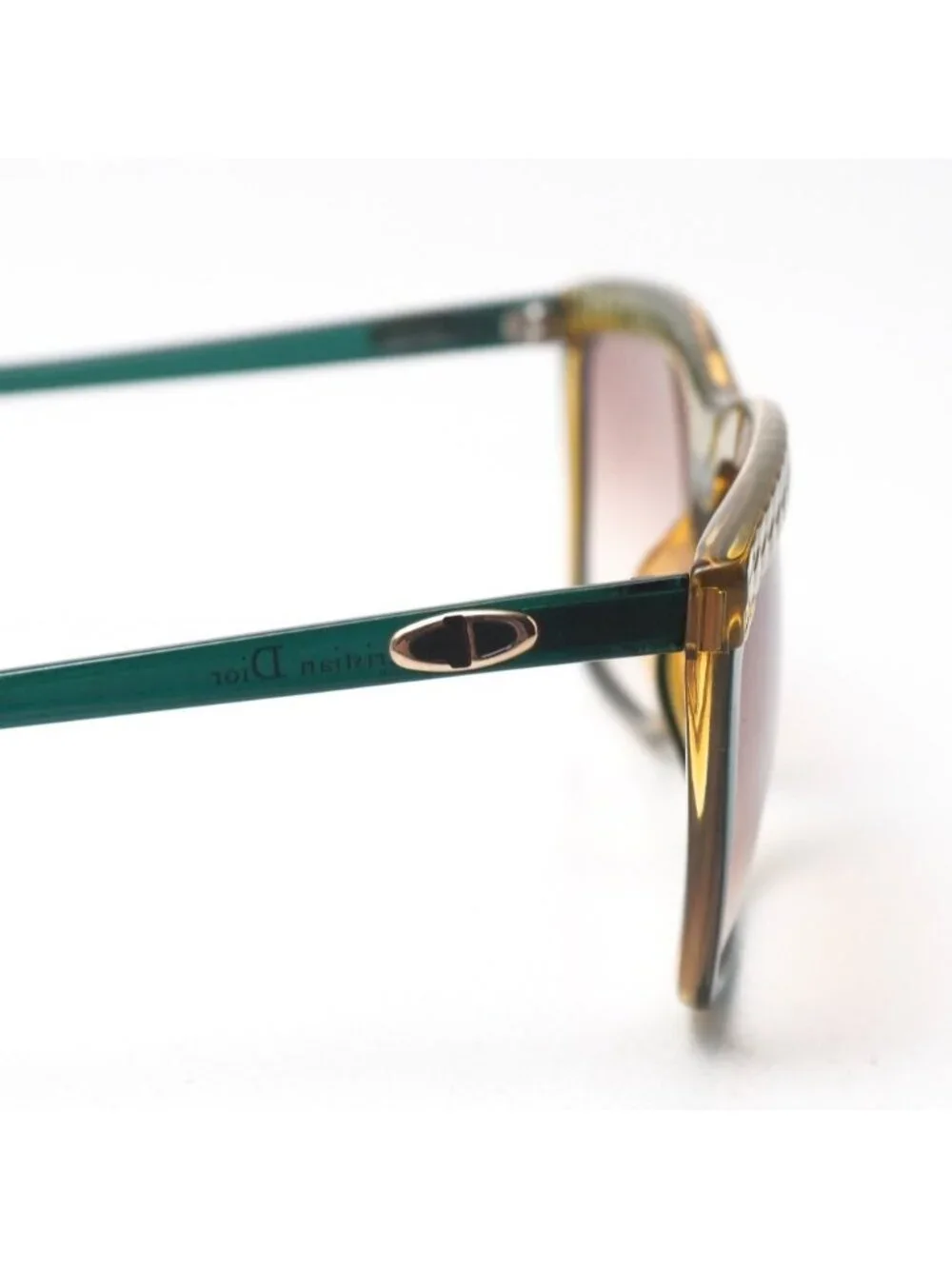 Christian Dior green frame noteworthy