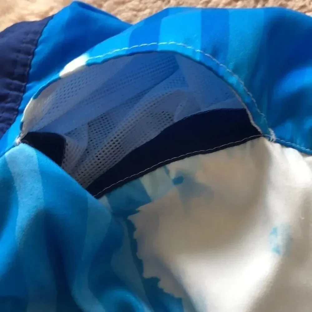 Corona bright color palm tree men’s swim trunks