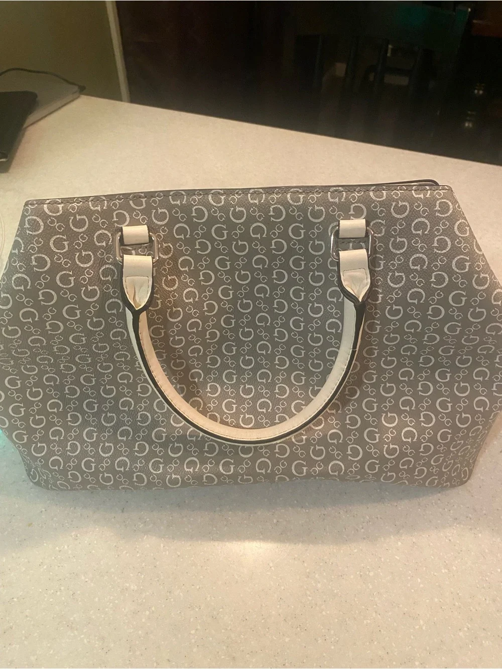 Guess satchel showcasing
