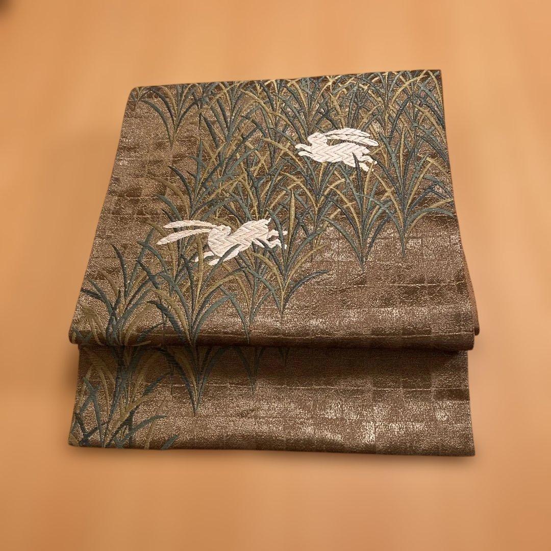 Fukuro obi, Sachiko Hanai, golden brown, rabbit, embroidery, gold thread, artist's seal