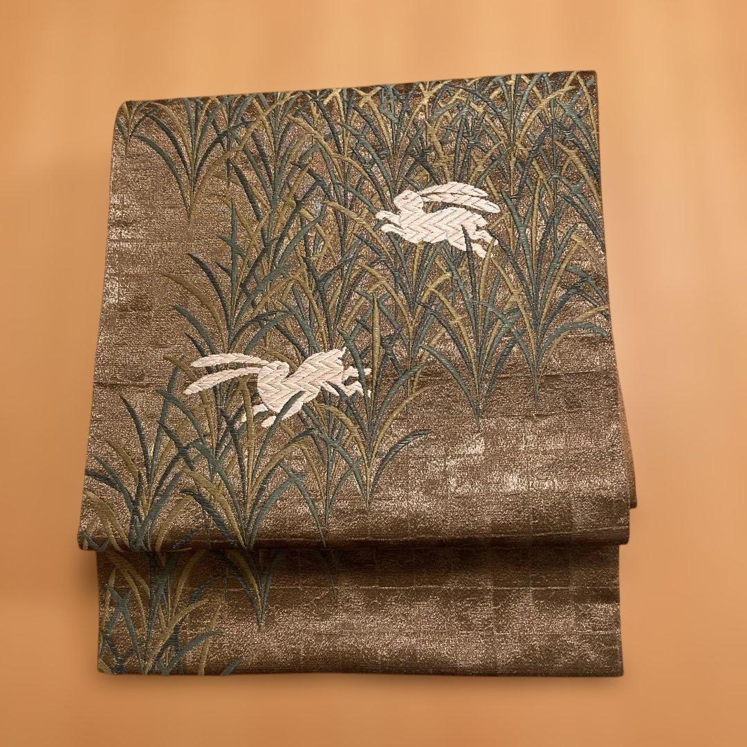 Fukuro obi, Sachiko Hanai, golden brown, rabbit, embroidery, gold thread, artist's seal