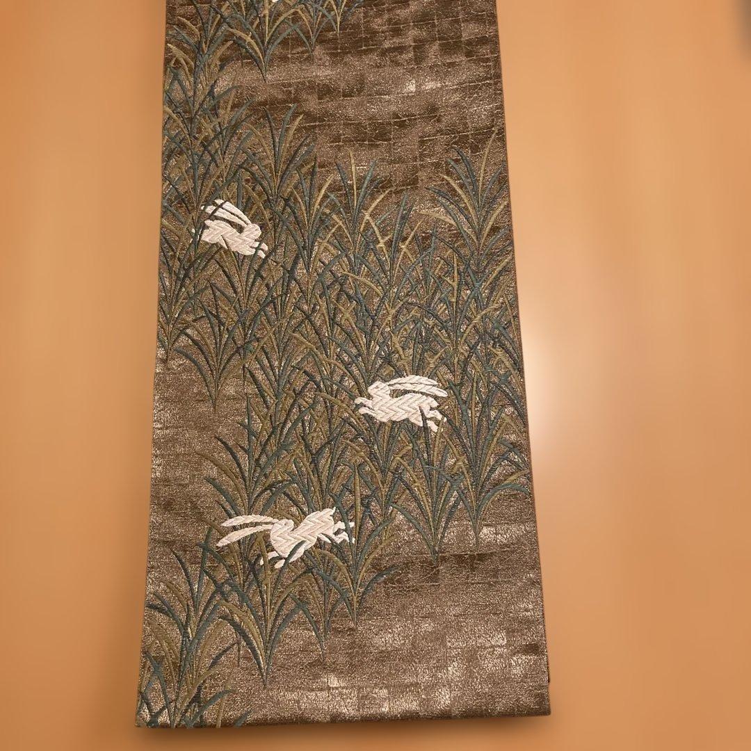 Fukuro obi, Sachiko Hanai, golden brown, rabbit, embroidery, gold thread, artist's seal